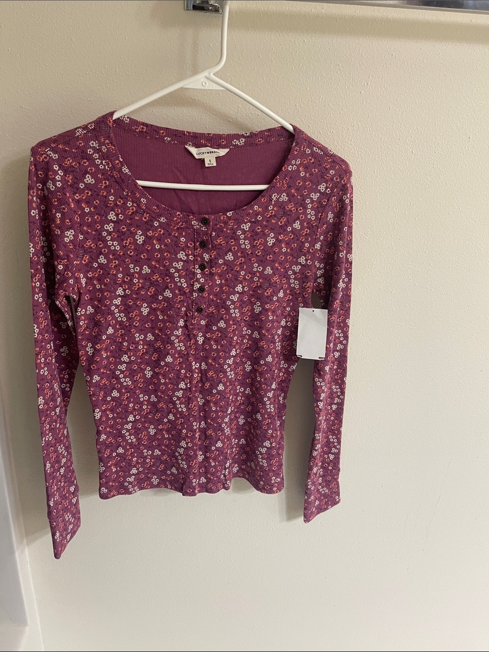 Women’s Floral Henley Long Sleeve top.